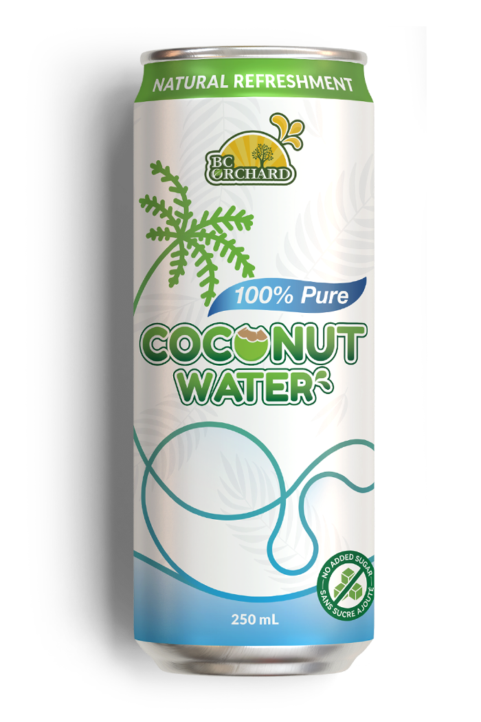 Young coconut pouring fresh coconut water into a glass—100% pure