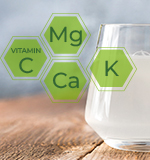 Glass of coconut water with C, K, Ca, Mg icons—rich in nutrients and electrolytes